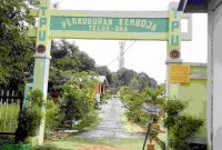 PT Timah bantu pembangunan pagar TPU Kamboja, Teluk Uma. Foto: Humas Timah