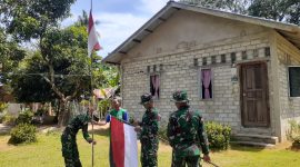 Satgas TMMD ke-117 beri imbauan pemasangan bendera ke masyarakat. Foto: Satgas TMMD