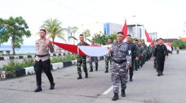 Jajaran TNI-POlRI Arak-arakan bendera di kawasan Coastal area pada Kegiatan Kirab Kebangsaan Merah Putih, sambut HUT ke-78 RI. Foto: Istimewa