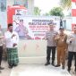 Foto bersama Kapolres Karimun AKBP Fadli Agus di lokasi Fasilitas Penyaluran air bersih di kampung Suka Jadi Desa Pangke. (Foto: Humas Polres Karimun)
