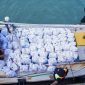 PT TIMAH Tbk Ringankan Beban Warga Penutuk Pasca Bencana Banjir Rob