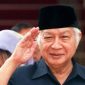 Foto: Presiden Kedua Republik Indonesia, Soeharto. (AGUS LOLONG / AFP)